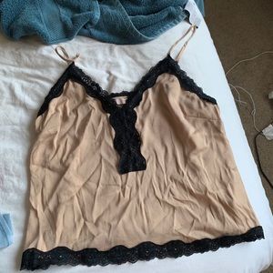 Nude top with black lace trim